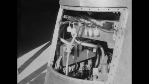 1946 - Men put a tip on top of the V-2 rocket. The camera focuses on parts of Stock Footage 221833717