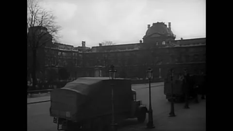 1946 - Trucks pull up to a museum in postwar Paris, bearing recovered art that Stock Footage 246357959