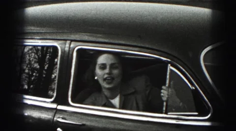 1946: woman is smiling and talking from the car HARRISBURG Stock Footage