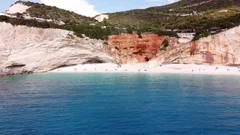 People Relax and Swim at Porto Katsiki Beach, Lefkada Island, Greece -