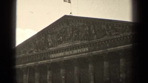 1947: a flag with three stripes waves on the top of a roof PARIS FRANCE Stock Footage 70657141