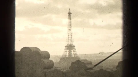 1947: looking out from the rooftop of a building at the eiffel tower PARIS Stock Footage 70686113