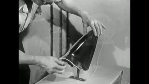 1947 - Malformed Plexiglas is reheated, light is piped through Plexiglas and Stock-Footage 79451533