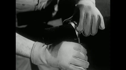 1947 - A Plexiglas cube is heated and compressed into a disk and then, reheated, Stock-Footage 79451527