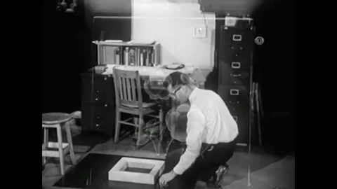 1947 - Plexiglas resists shattering as it is hammered and broken and the shards Stock-Footage 79451544