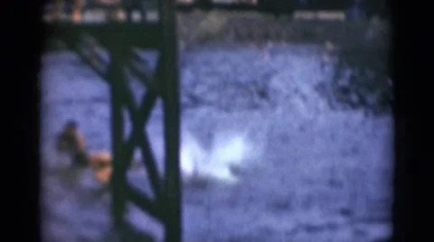 1947: teenagers are jumping in the water MIDDLETOWN Stock Footage