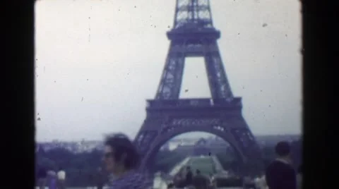 1949: Eiffel Tower view man wanting picture taken at historic monument. PARIS, Stock Footage 63950221