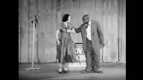 1949 - In a Harlem Burlesque comedy show, a woman undresses for a lesson at the Stock Footage 164453455