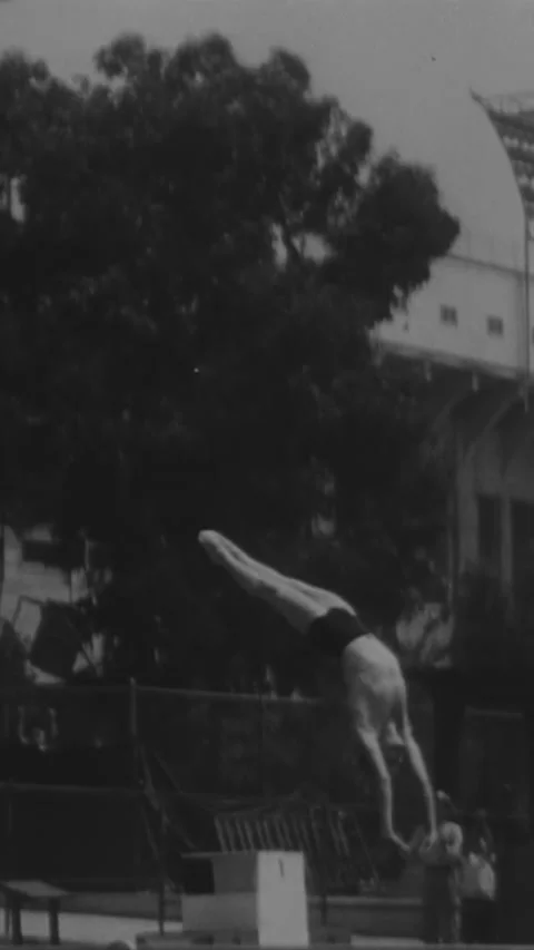 1949 - Slow motion is used to capture a diving competition at a Los Angeles Stock Footage 287568794
