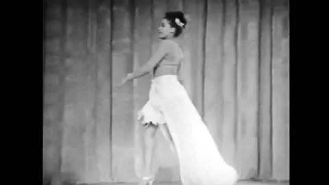 1949 - Striptease contortionist Tarza Young performs in a Harlem burlesque show. Stock Footage 164453445