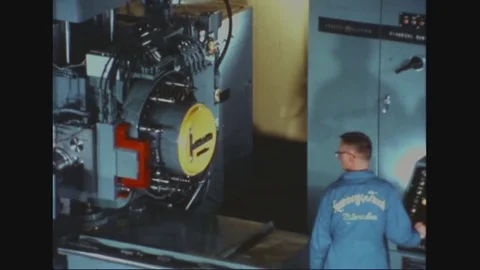 1950 - An automatic multi-machining center has numerical controls, a card Stock Footage 83105081