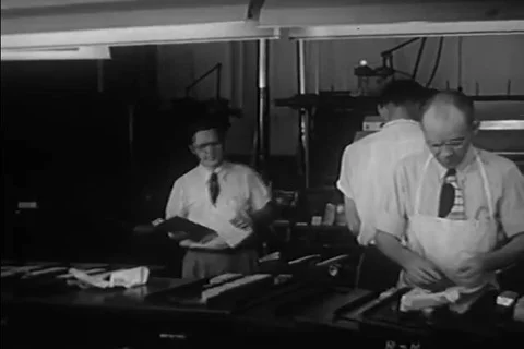 1950 - A draft of a newspaper story is printed, and sent to a proofreader. Video stock 99460771