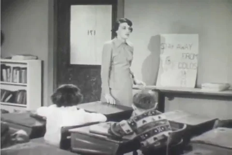 1950 - Elementary school students learn some tips on how to avoid spreading cold Stock Footage 99403072