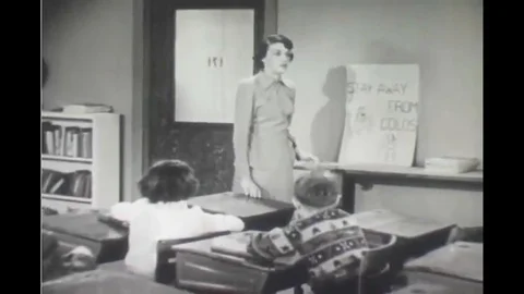 1950 - Elementary school students learn some tips on how to avoid spreading cold Stock Footage 118858035