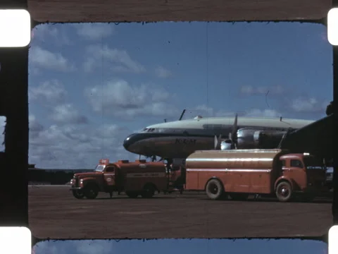 1950 film of a Lockheed Constellation plane at Gander Airport. 16mm 2k overscan Stock Footage 329802458