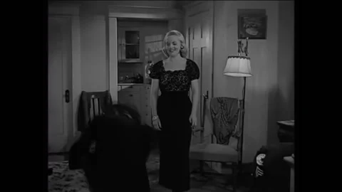 1950 - In this film noir, police arrest a femme fatale when they link the Stock Footage
