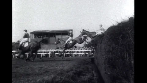 1950-GRAND NATIONAL STEEPLECHASE: horse skills and thrills from England Stock Footage