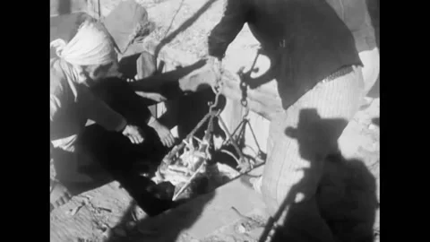 1950 - Men killed in a mining accident in Hamhung, Korea are brought up out of Video stock 168877801