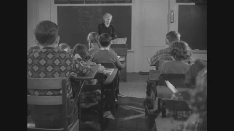 1950 - As students break for lunch in a one-room schoolhouse in Vermont, their Stock Footage 157156823