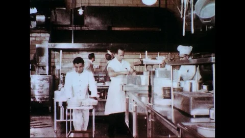 1950s-1960s : Health inspectors examine the kitchen of a restaurant. Stock Footage