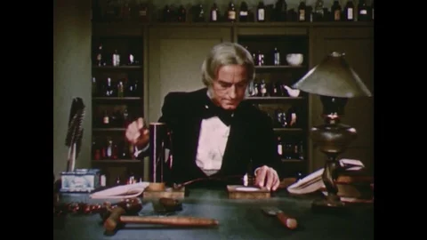 1950s: Actor Playing Michael Faraday Works in a Science Lab Stock Footage 74923791