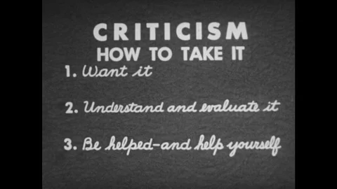 1950s: Animated text about taking and giving criticism. Stock Footage 74920314