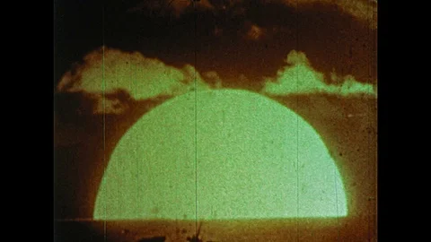 1950s: Animation of nuclear blast over city / View of blast, smoke / Animation Stock Footage 74687299