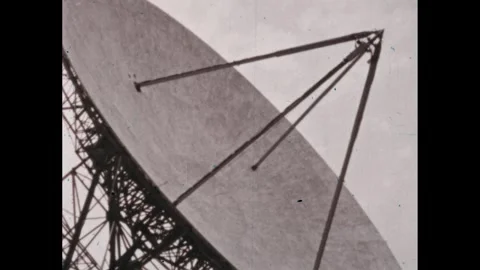 1950s: Array dish at observatory. Photograph of echoes. Illustration of planets. Stock Footage 294142535