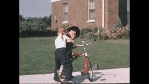 1950s: Boy and girl fight and slap at ea... | Stock Video | Pond5