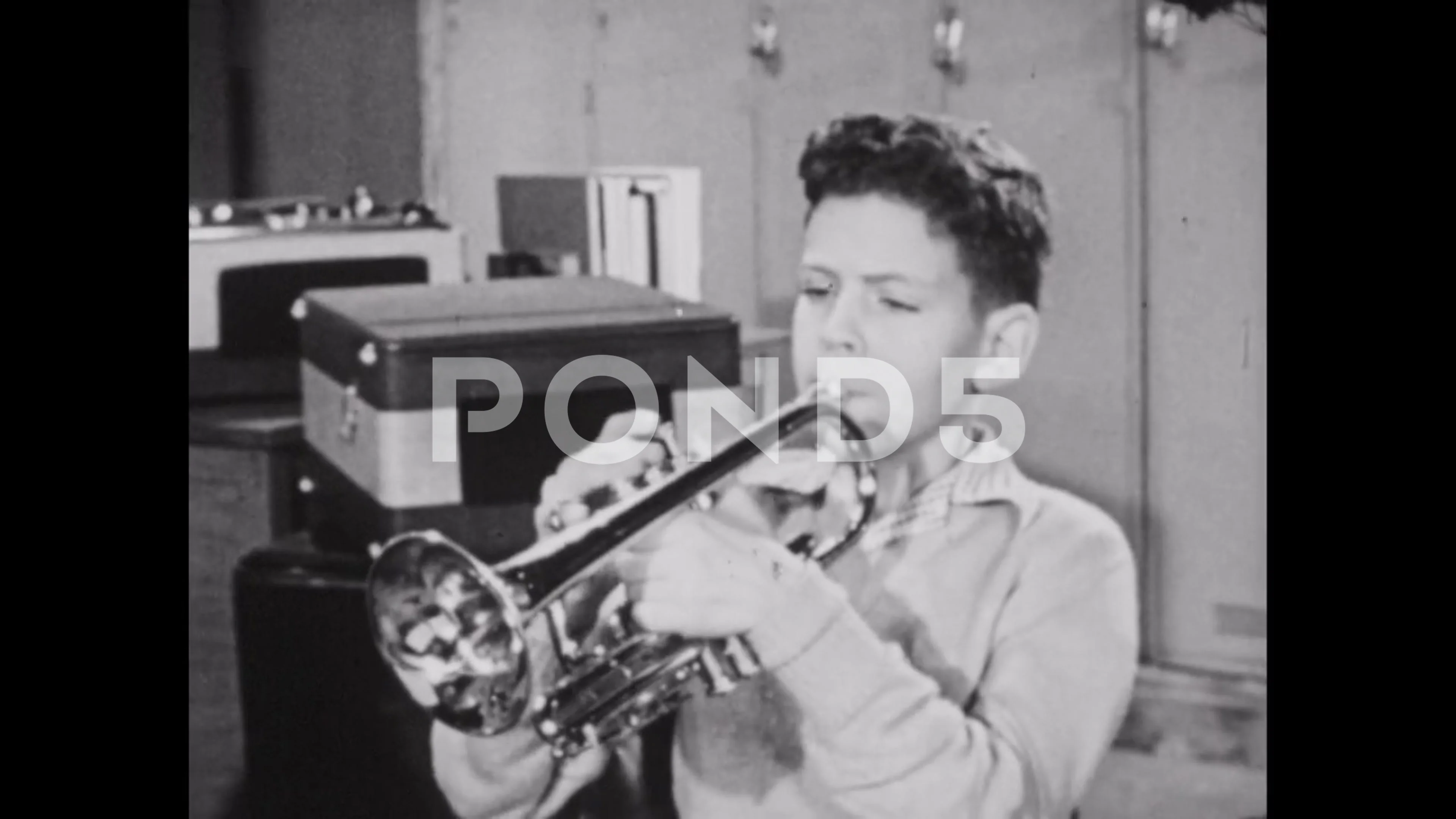 1950s: Boy plays tuba. Boy plays trumpet, Stock Video