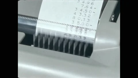 1950s: Burroughs adding machine, strikers hit paper, print numbers, spool Stock Footage 219631224