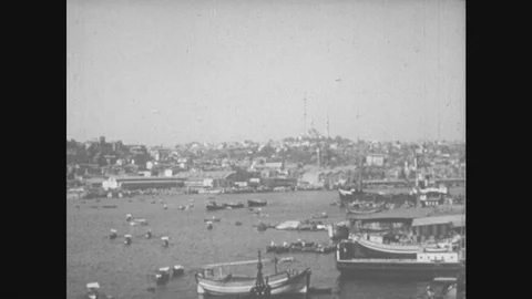 1950s: Busy canal. Busy streets. Beautiful architecture. Splendid building Stock Footage