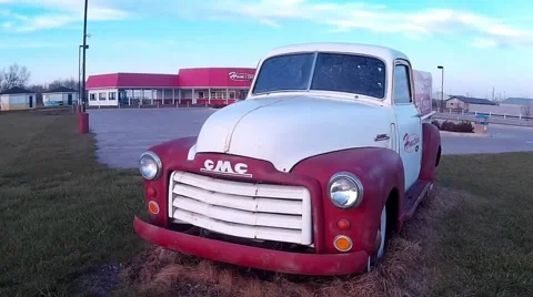 1950s classic GMC pick up outside retro diner Stock Footage 58400441