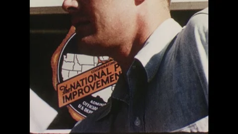 1950s: Close up, man walks through door, sign on door. Hand opens drawer of baby Stock Footage 127731428