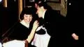 1950s COUPLE Man Kissing Laughing Womans Neck Restaurant Vintage Film Home Movie HD Footage