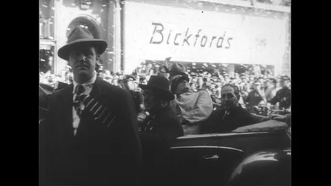 1950s: Douglas MacArthur waves from car in New York parade / View of city, Stock Footage 74538541