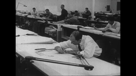 1950s: Engineers work to design rockets in a facility. Stock Footage 74511781