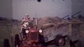 1950s Farmer Father and Son Little Boy Ride Tractor Vintage Old Film Home Movie HD Footage