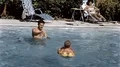 1950s Father and Baby Boy Son Play in Pool Tender Moment Vintage Film Home Movie HD Footage