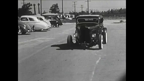 A 1950's film about racing hot rods, muscle cars, and the kids who love and race Stock Footage