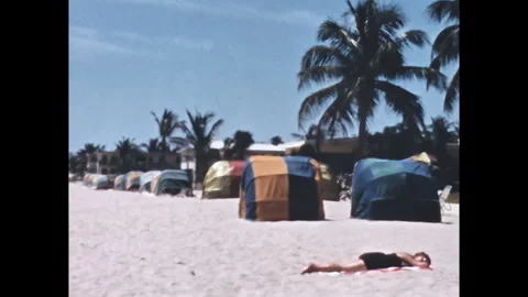 1950s Florida beach sunbathing at Surf n Fun resort, vintage 2K scan Stock Footage 314991937