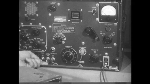 1950s: Hand adjusts knobs on machine. 스톡 동영상 89858395
