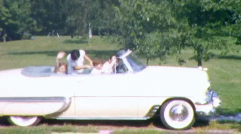 1950s Happy Family WAVING CAR Convertible CADILLAC Vintage Old Film Home Movie Stock Footage