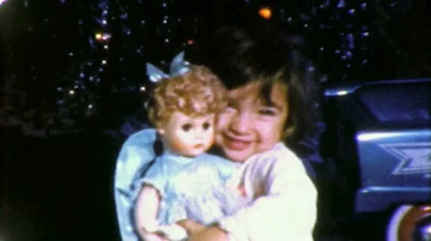 1950s Happy Little Girl NEW Doll on Christmas Morning Vintage Film Home Movie Stock Footage