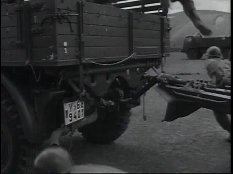 1950s- A housewife turns various knobs on her Frigidaire stove. 스톡 동영상 75188720