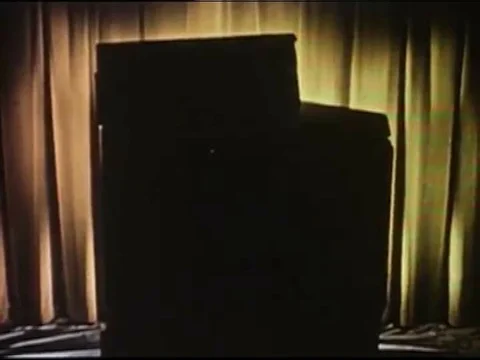 1950s  A housewife turns various knobs on her Frigidaire stove. 스톡 동영상 83213145