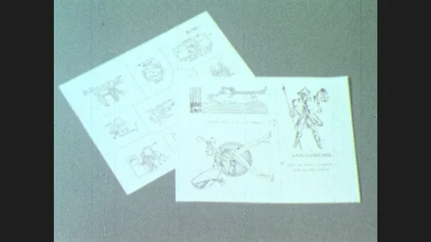 1950s: Illustrations on paper. Stencils on light box. Stack of copy paper, paper Stock Footage 85827597