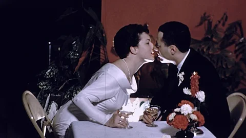 1950s JUST MARRIED Bride Groom KISS Romantic Dinner Wedding Vintage Film Movie Stock Footage 87277036