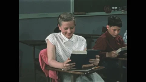 1950s: Kids reading in classroom, girl s... | Stock Video | Pond5