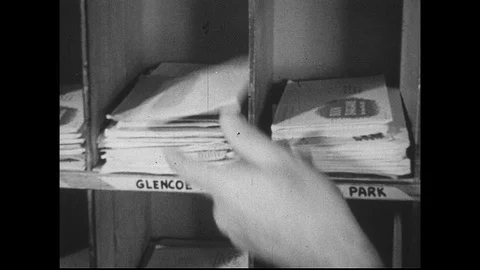 1950s : Letters in a post office are sorted according to final destination and Stock Footage